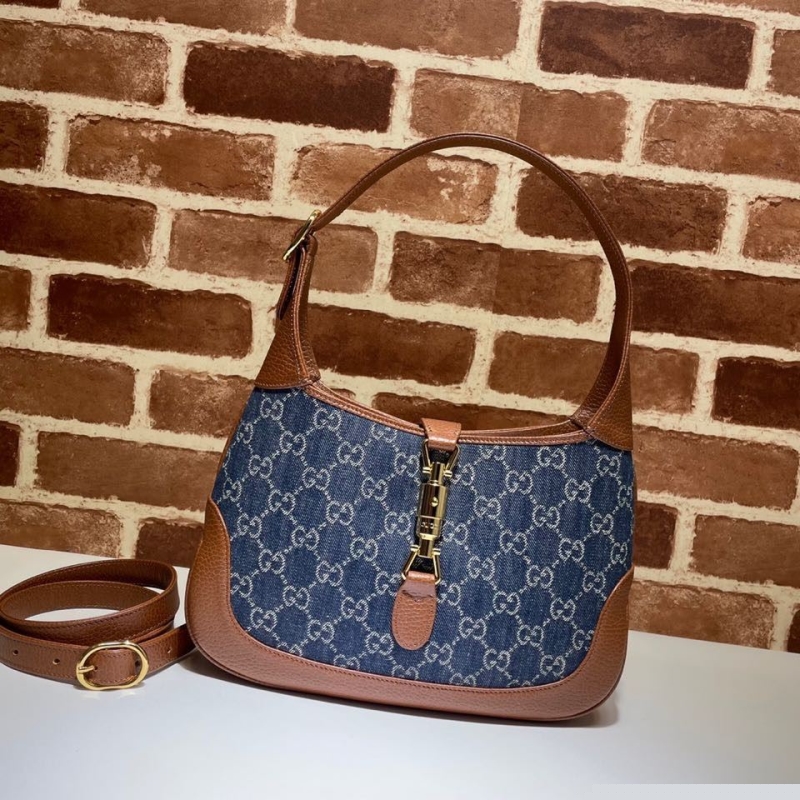 G*u*i top handle bags
